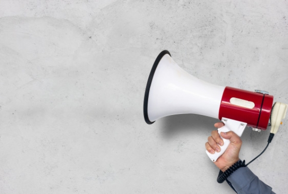 0001_hand-man-holding-megaphone-white-brick-wall-background_41050-1866_1557919788-9dc501607bceba2b0b4270bb6f2ac7e9.jpg