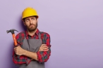 0001_photo-thoughtful-tired-mannual-worker-holds-hammer-keeps-arms-crossed-chest-thinks-about-what-repair-m_1752556725-9c8406fb58927e3686738a278b7ddd5b.jpg
